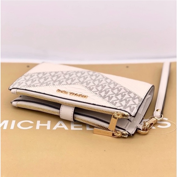 MICHAEL KORS LG
DOUBLE ZIP
WRISTLET
WALLET PHONE
HOLDER LIGHT
CREAM MULTI - Picture 9 of 12